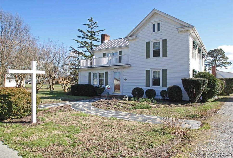 Lovely curb appeal with nice walkways & landscapin