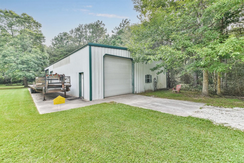 9441 Oak Bend Ct, Cleveland, TX 77328 - photo 1