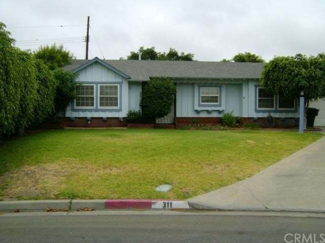 The home at 311 N. Bircher Street features 3 bedro