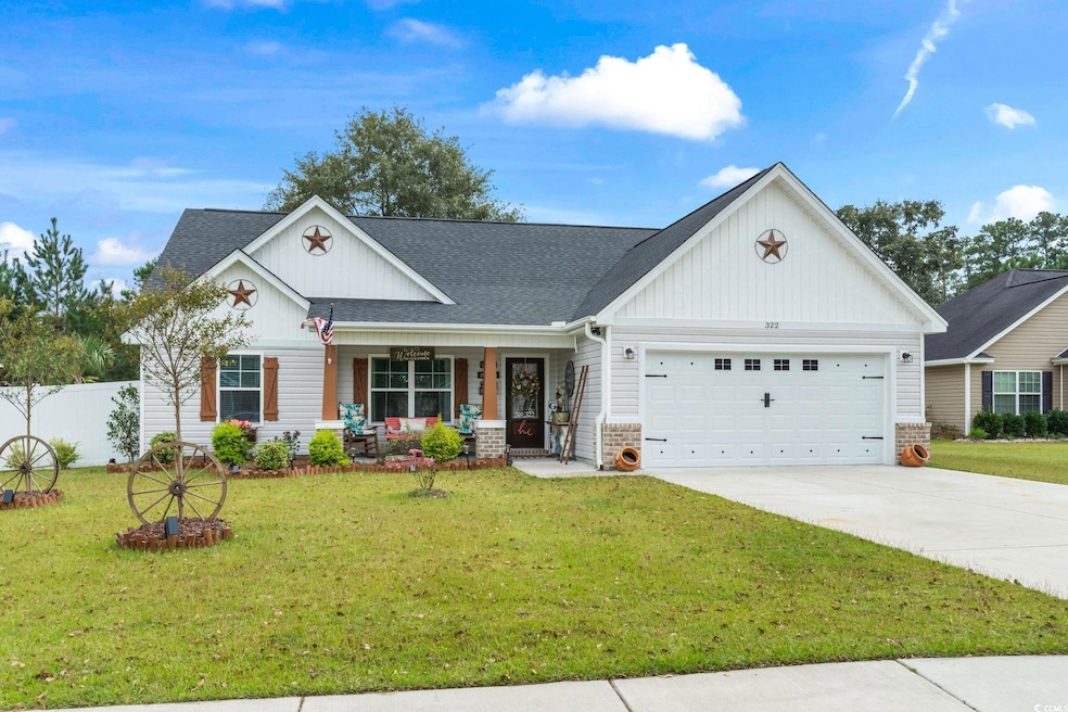View of front of property featuring a front lawn, 