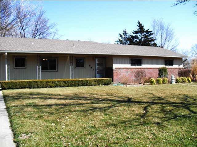 Wonderful covered front porch and established land