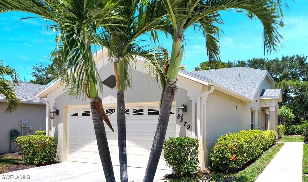 View of side of property featuring stucco siding,