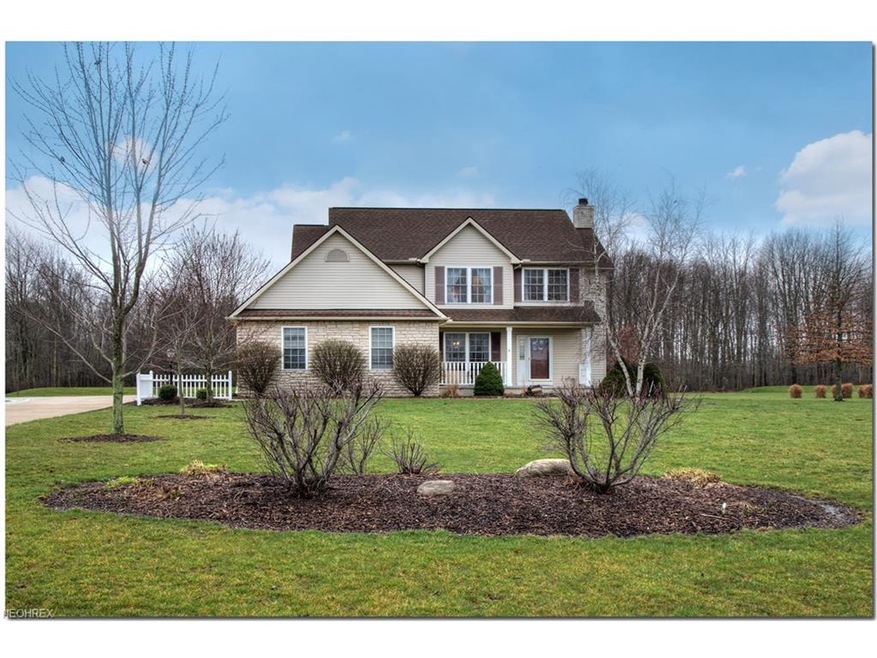 Wonderful curb appeal....spring flowers right arou