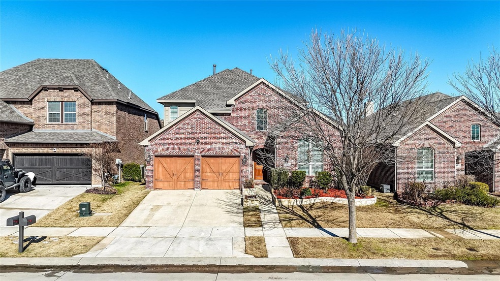 Front of property with a garage