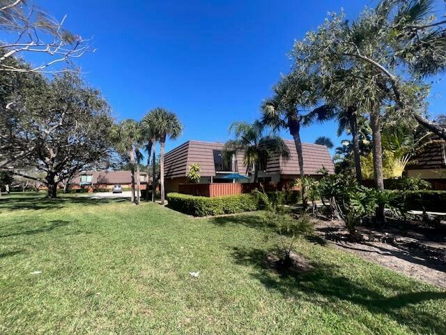 1424 14th Ct, Jupiter, FL 33477 - photo 1