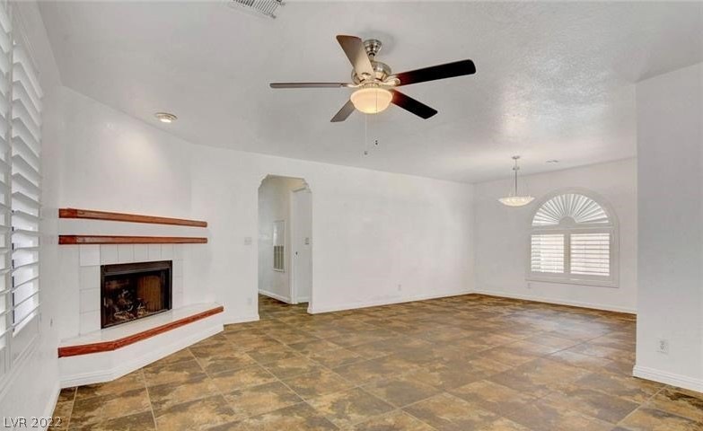 PREVIOUS PHOTO  fireplace AND ceiling FAN - TLE TH