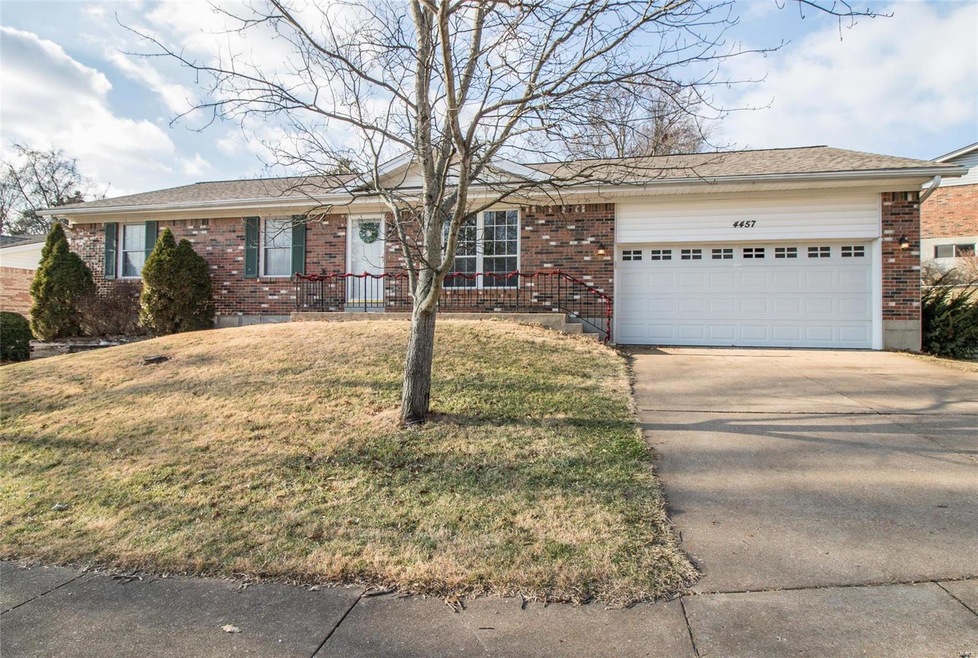 Front w/ 2 car garage