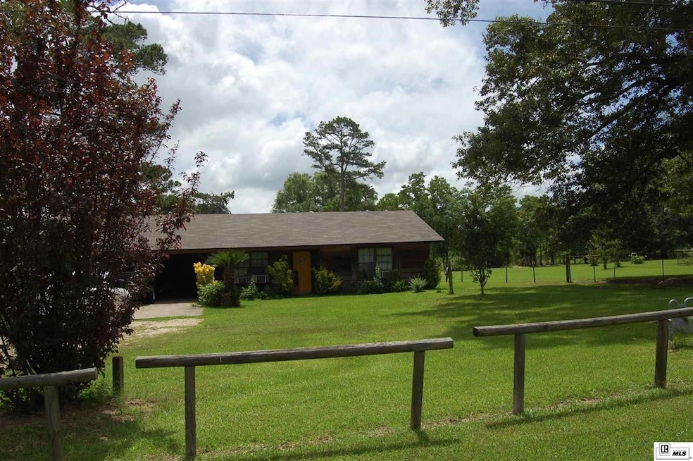 11998 Crossett Rd, Bastrop, LA 71220 - photo 1