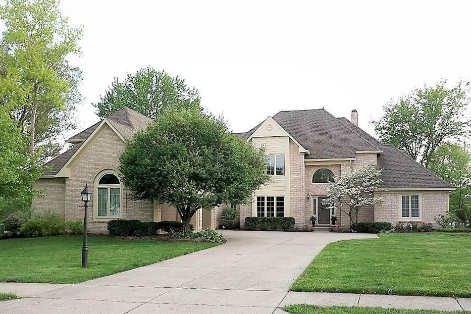 Welcome home to this fresh as a Daisy custom home on a golf course with a pond view. All new siding, gutters, downspouts and paint in 2017 really set this home off in elegance. Mature landscape and fully irrigated lawn make life easy, just sit back and enjoy!