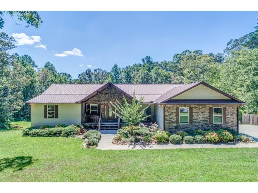 Well maintained home on 1.5 acres just minutes fro