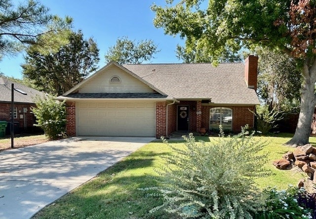 Ranch-style home featuring concrete driveway, an attached garage, a chimney, brick siding, and a shingled roof