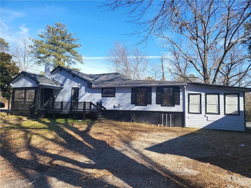 View of front of home featuring a deck