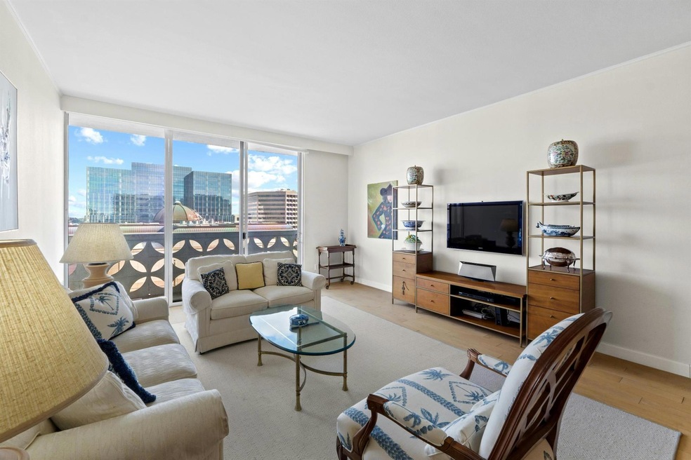 Living area featuring baseboards and wood finishe