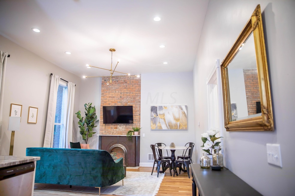 60 W Ave - Rear Apt-1