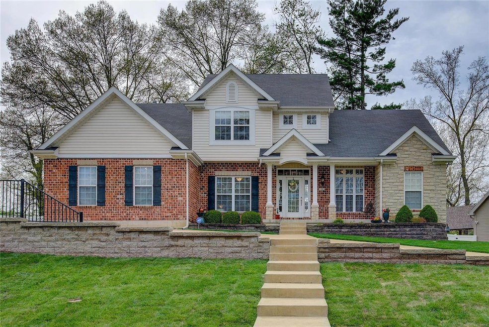 Welcome to 1555 Windridge Drive in Harwood Hills