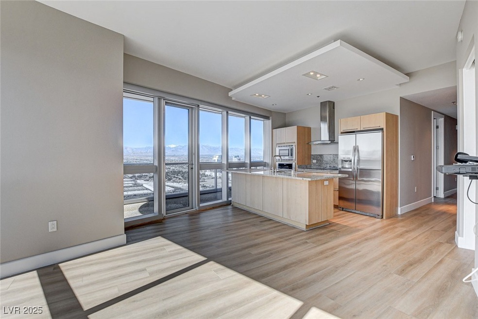 Kitchen with wall chimney range hood, modern cabin