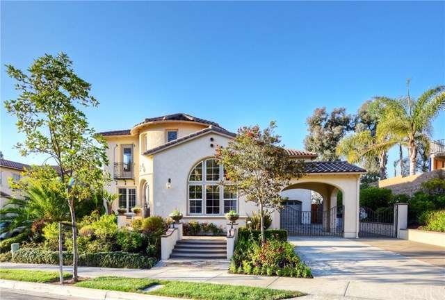Front of Home that is Well Manicured with Private 