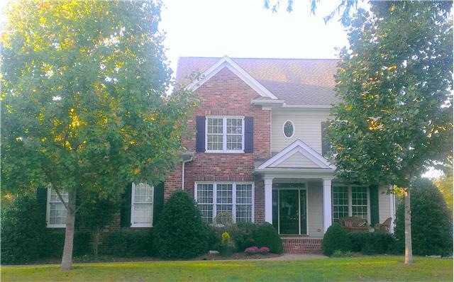 Beautiful maples grace the front yard. This gracious family home in Willowsprings has much to offer. 