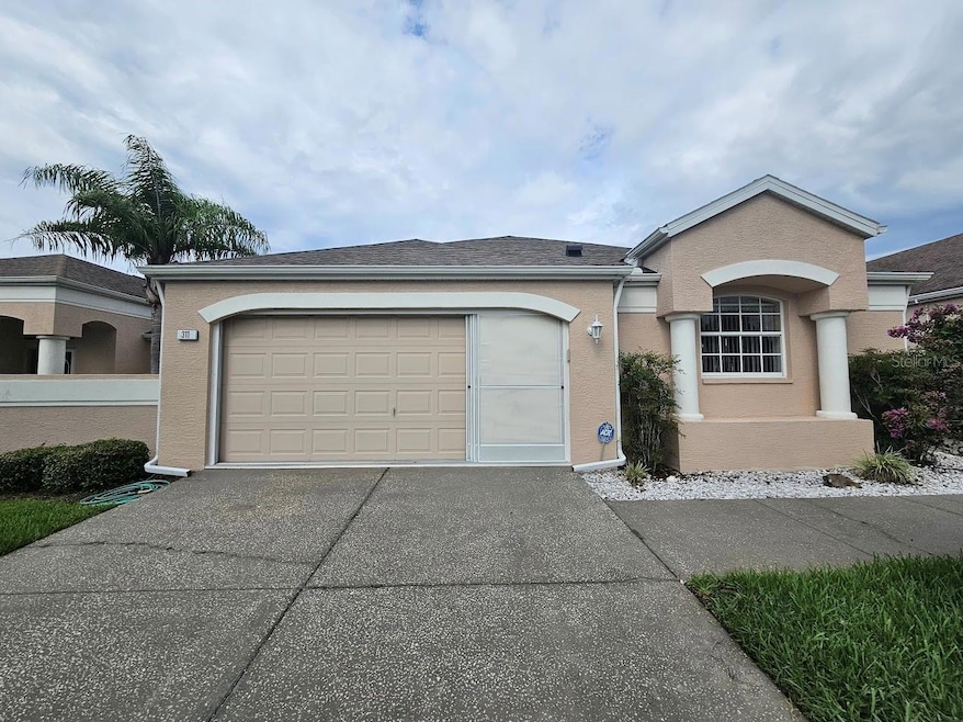 311 Royal Palm Way, Spring Hill, FL 34608 - photo 1