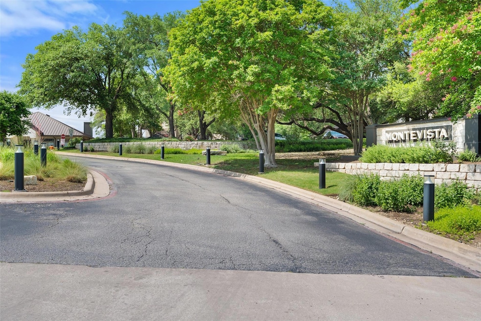 View of asphalt street with curbs