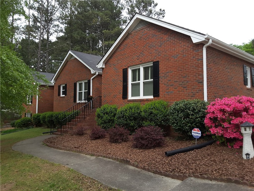 1514 Hewatt Rd SW, Lilburn, GA 30047 - photo 1