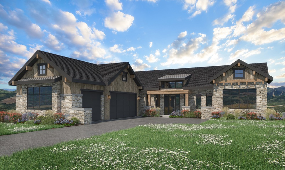 View of front facade with stone siding, a standing seam roof, a front yard, a garage, and driveway