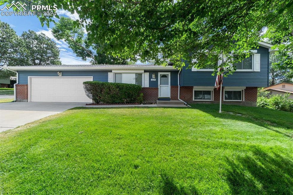 Front of home faces west and is on large corner lo