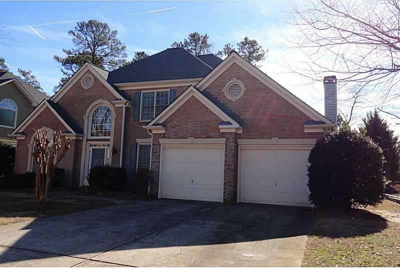 Exterior Front. Welcoming brick front home