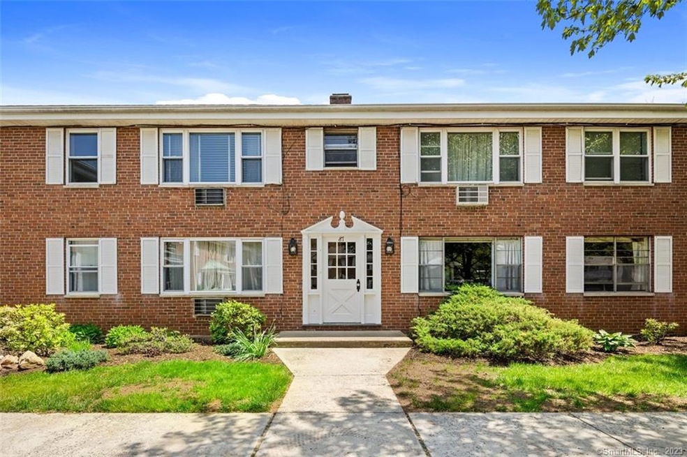 Front entrance, unit is upper left