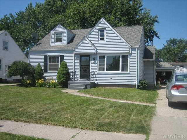 Exterior Front. Vinyl siding arch roof.