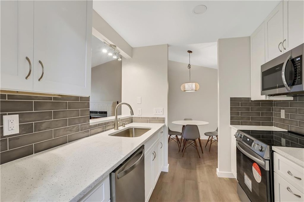 Kitchen featuring stainless steel appliances, new 