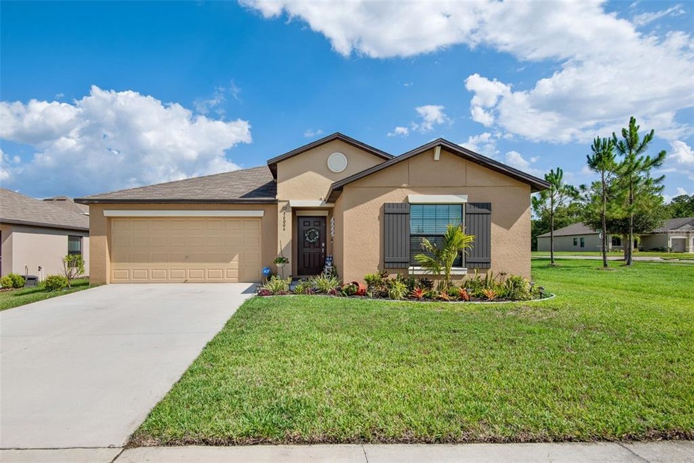 Beautiful Corner homesite with long driveway.