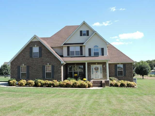 4 bedroom . 3 bathroom brick home with bonus room , covered back porch and 2 car garage.