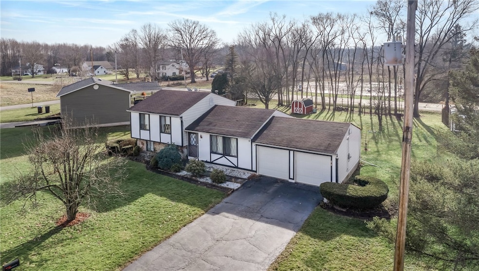 Well maintained split level w/ attached 2 car gara