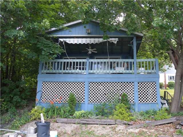 Exterior Front Main cottage closest to lake with 1