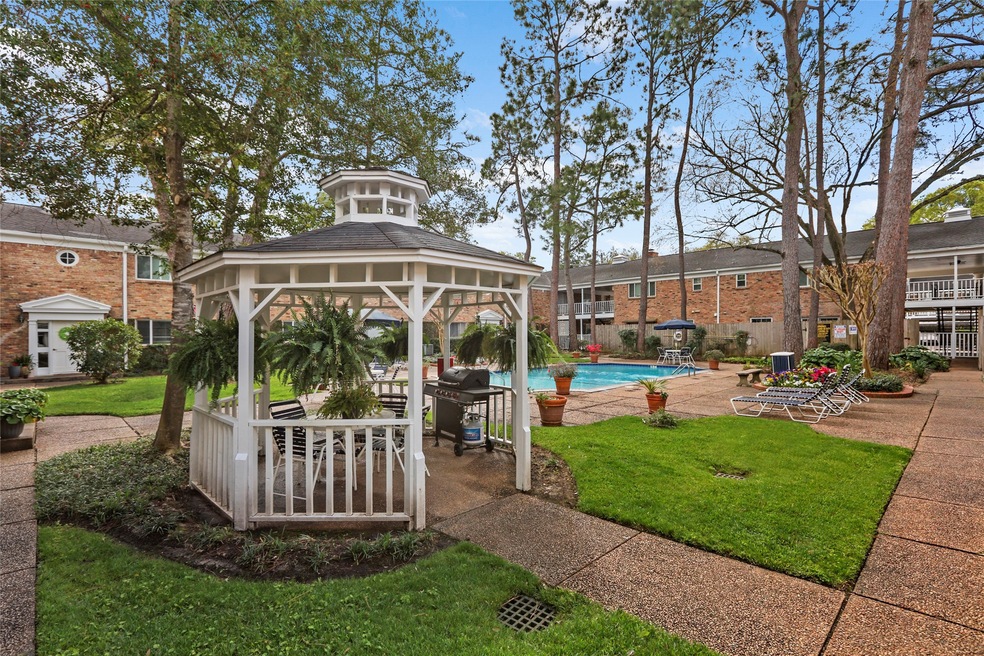 Enjoy serene views of the lush courtyard and invit