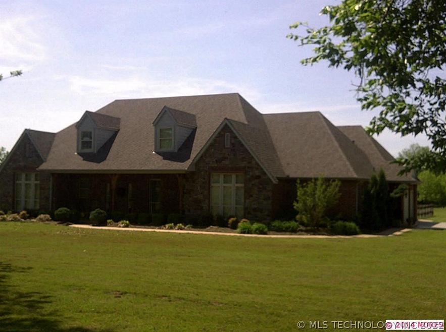 Front of Home located on approx 5.7 acres