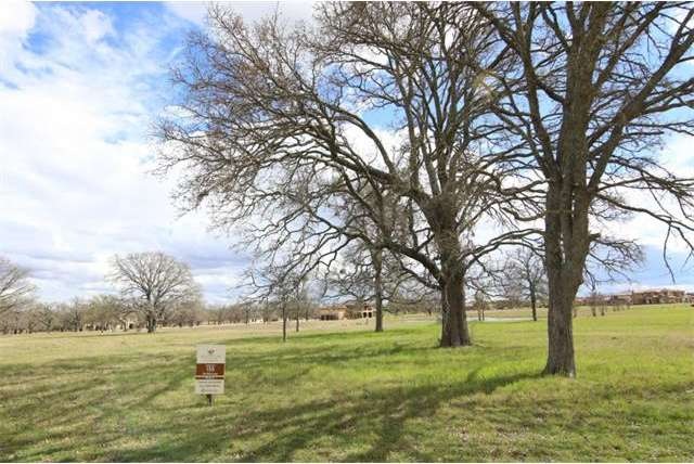 Great trees on this level lot with a view of the n