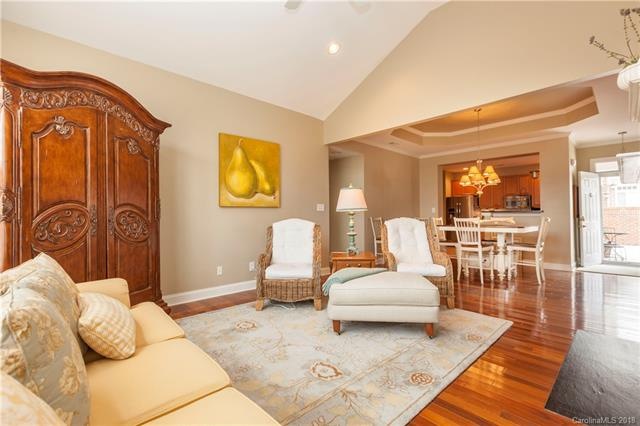 Gleaming real Teak hardwood floors and vaulted cei