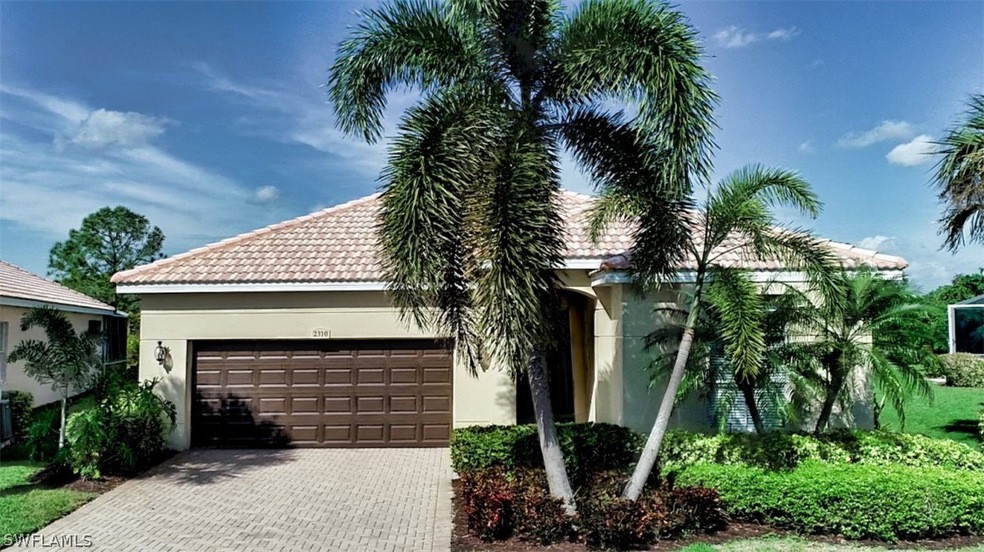 Mature landscaping adorns the front and back yards