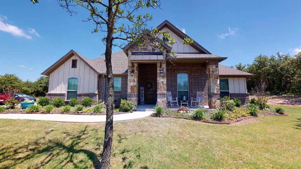 329 Timbers Cir, Poolville, TX 76487 - photo 1