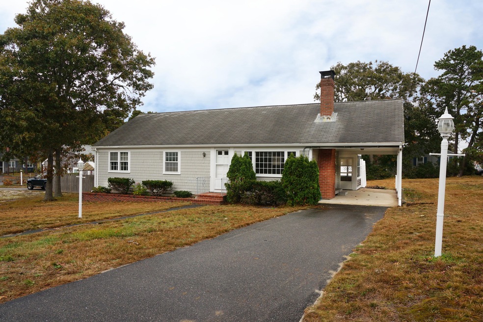 Front with carport fixed