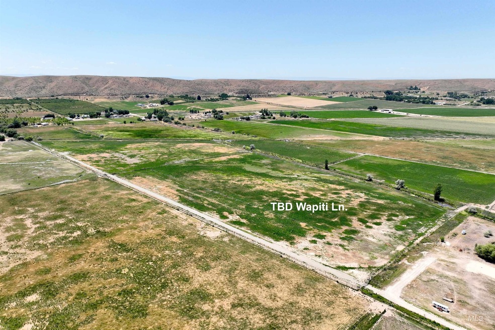 Aerial view of property and surrounding area with rural landscape