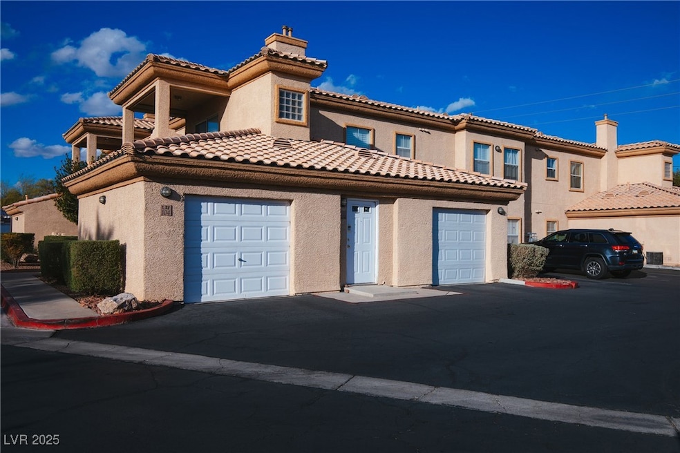Mediterranean / spanish-style house with a tiled r