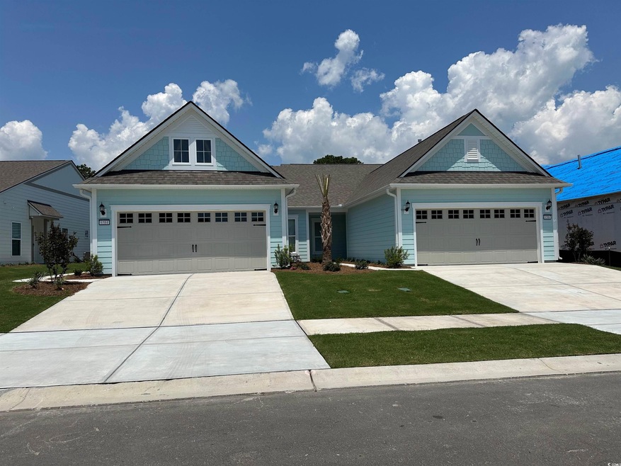 Craftsman-style home featuring a garage