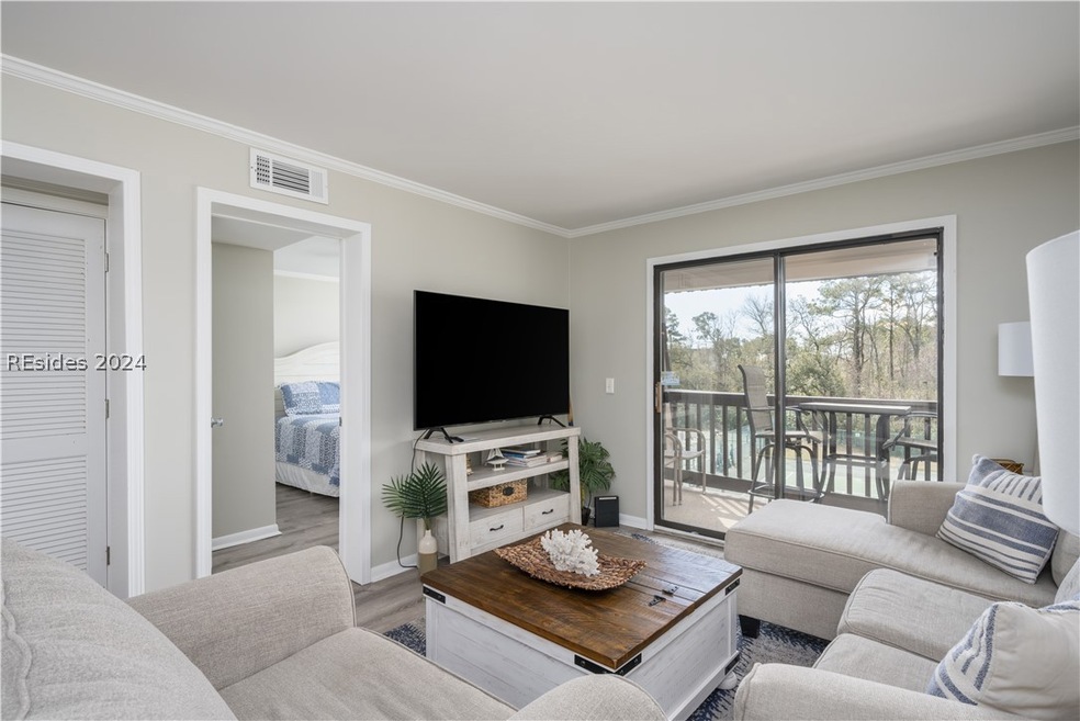 Living room featuring hardwood / wood-style floors