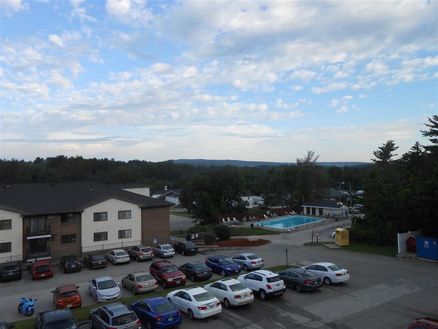 View of community, mountains in distance, Pool, pa