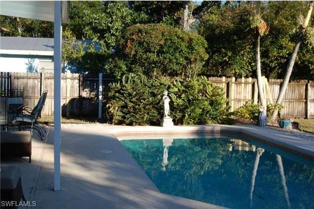 Large fenced back yard with pool!