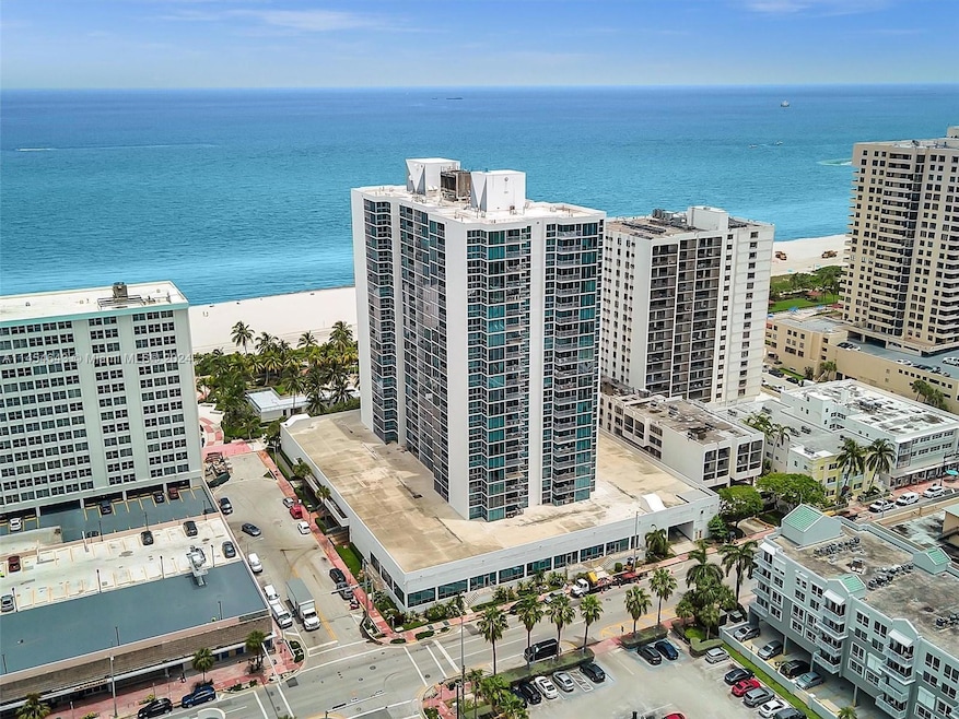 Direct oceanfront building; pool and boardwalk.