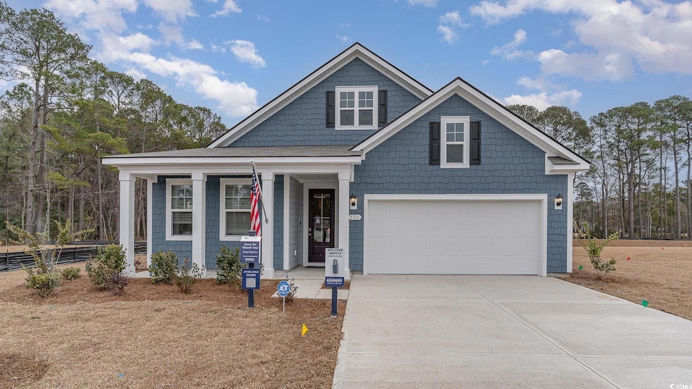 View of front of home with a garage
